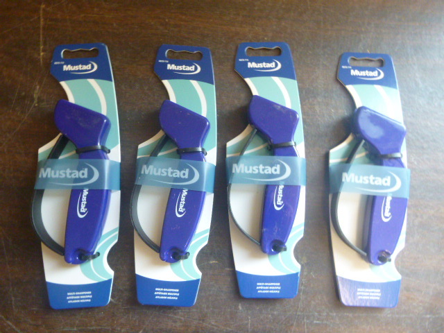 lot 112 image: 4 Mustad Multi-Sharpeners