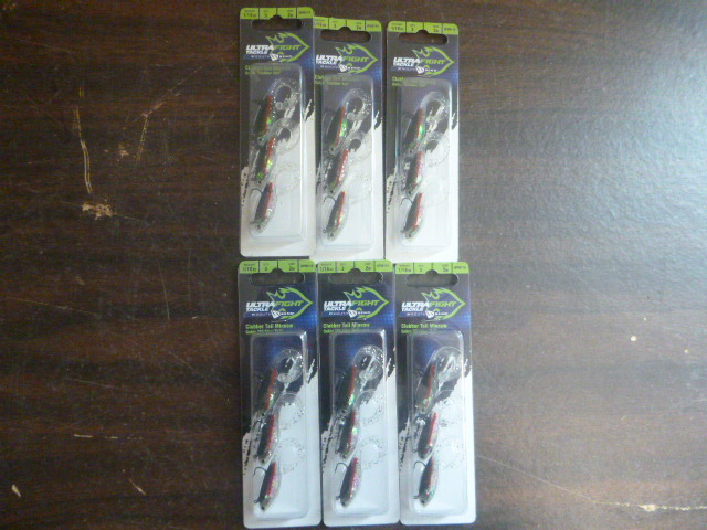 lot 178 image: 6 Packs of South Bend Ultra Fight Tackle Clubber Tail Minnows