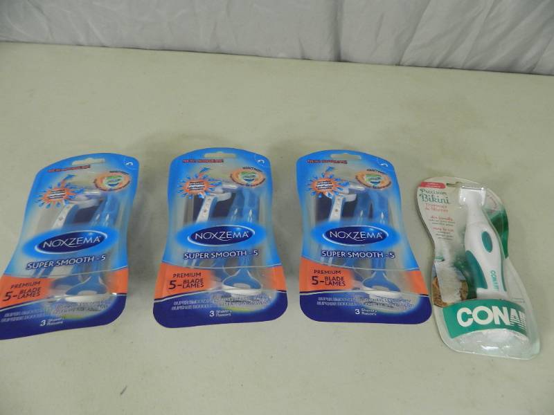 lot 46 image: New Noxzema Razors and New Conair Trimmer