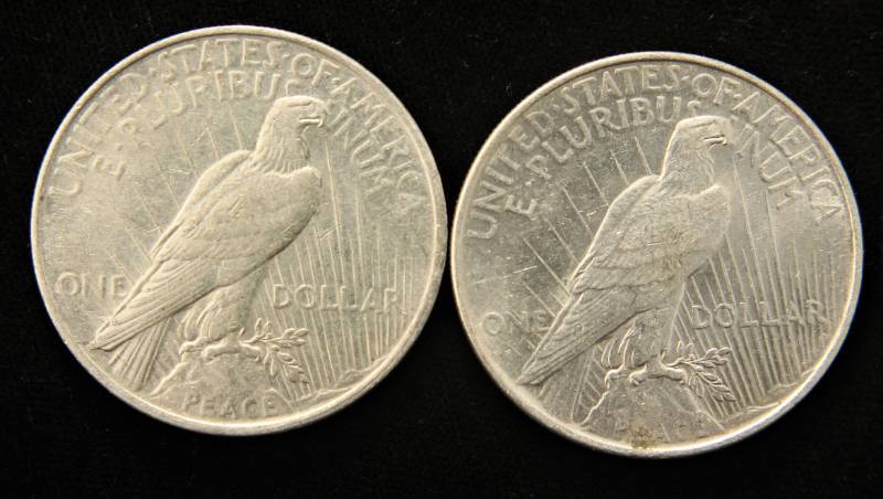 2 HIGHER GRADE 1922 PEACE SILVER DOLLARS