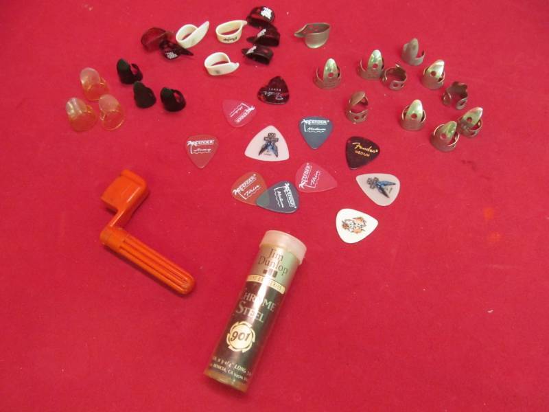 lot 155 image: guitar picks, tone bar