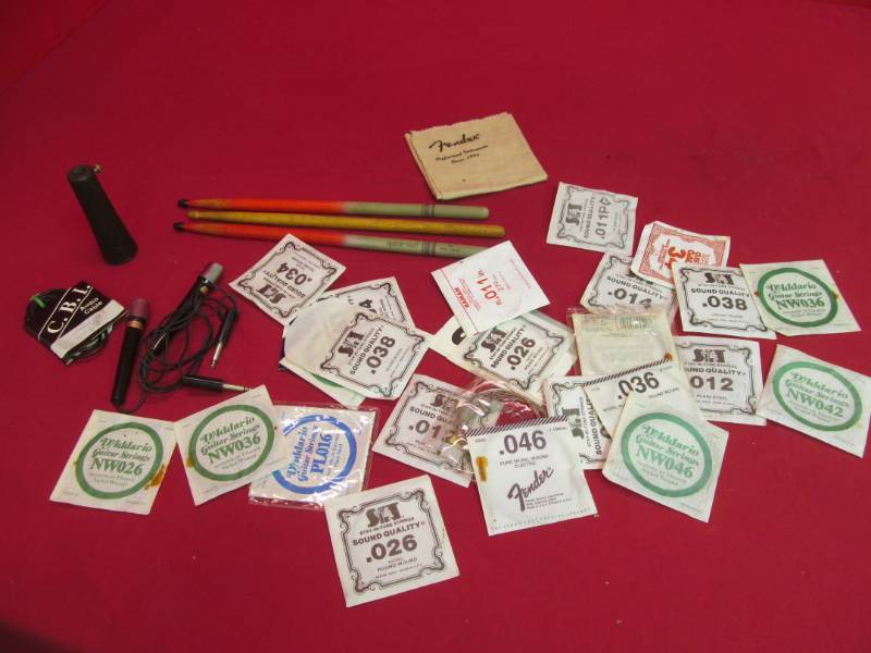 lot 156 image: Guitar strings, dust cloth