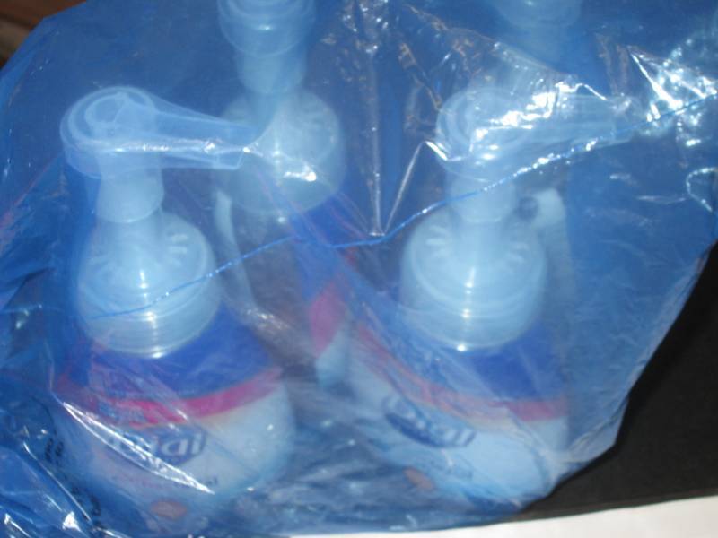 4 bottles of foam handsoap dial...