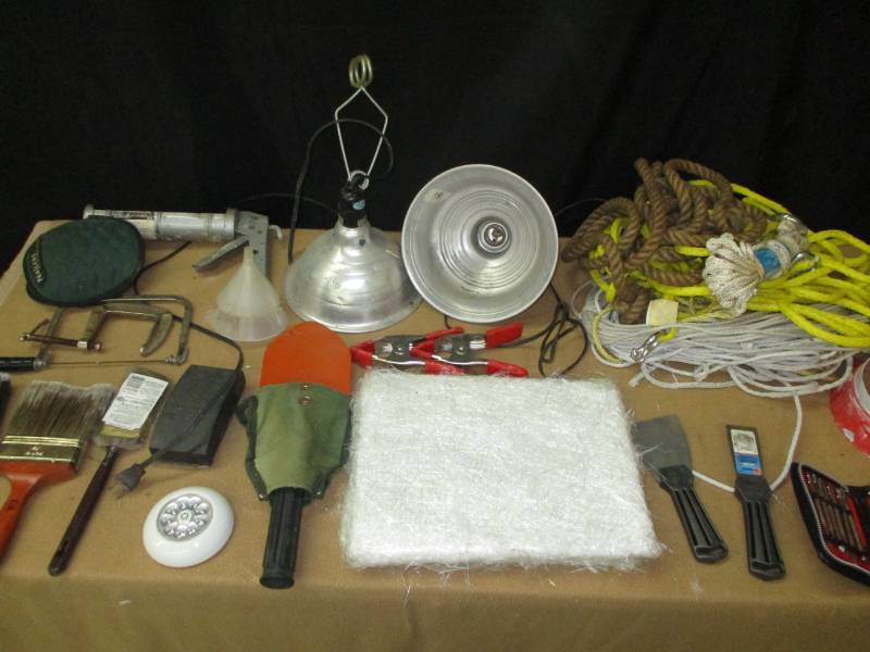 lot 25 image: Screwdriver set, Fiberglass matting, Shover, Riopes, Cramps, Sea Clamp, Lights, Saw, Paint Brushes, Knee pads