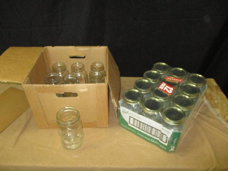 lot 32 image: Quart Mason canning Jars