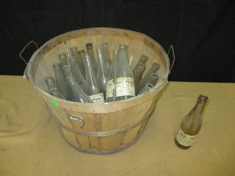 lot 59 image: Bushesl Basket full of old Bottles