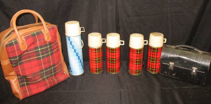 lot 78 image: Collection of old Thermoss they keep the heat the best and a lunch box