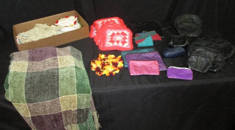 lot 86 image: Cosmetic cases, nice soft throw and potholders and napkins