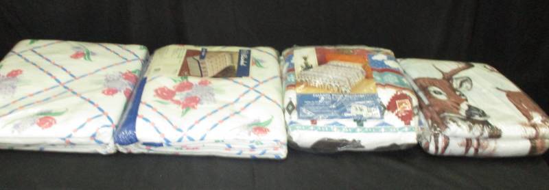 lot 128 image: 4 blankets unopened
