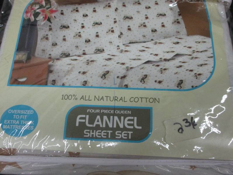 lot 135 image: Queen Sized Flannel Sheet Set, All Natural Cotton and fits extra thick matress