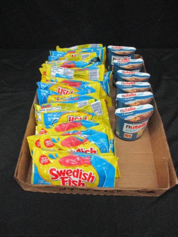 lot 250 image: 29 bags swedish fish and 6 nutella packs