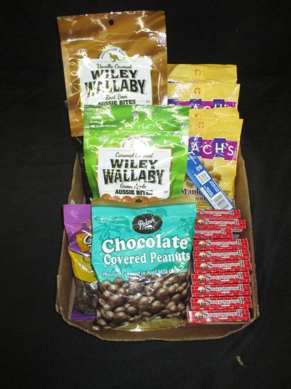 lot 238 image: 15 packs of licorice, nuts, raisins, goodoies