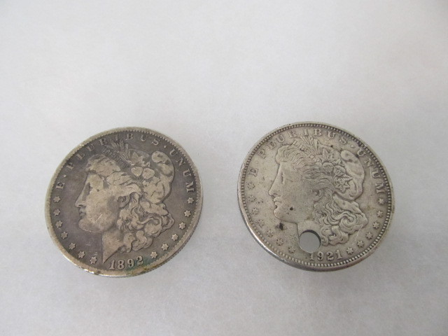 lot 20 image: 2 Morgan Silver Dollars