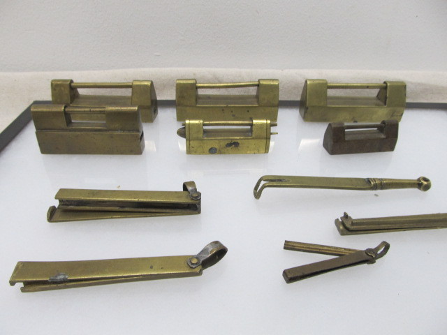 lot 40 image: Group of Antique Solid Brass Oriental Trunk Locks