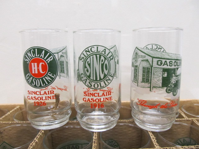 lot 212 image: Vintage SINCLAIR Motor Oil Advertising Drinking Glasses - Lot of 50