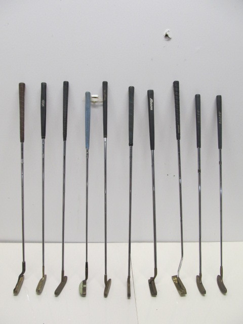 lot 218 image: Group of Brass Head Putters