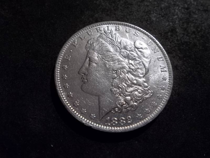 lot 15 image: 1882 O Morgan Silver Dollar