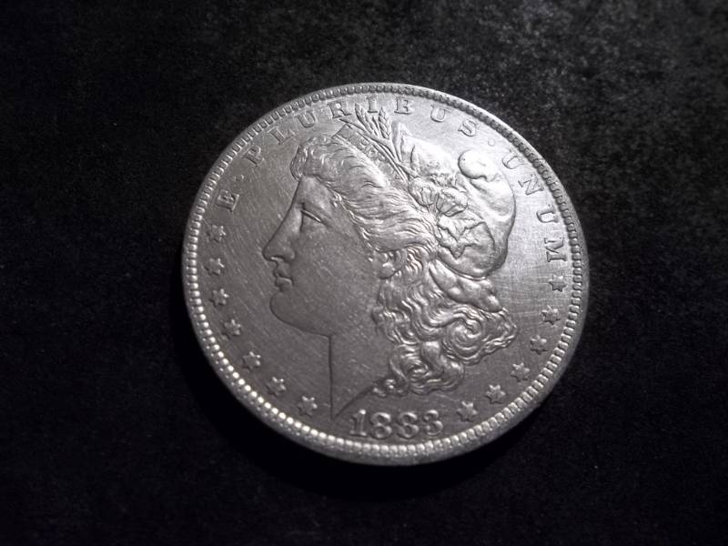 lot 16 image: 1883 O Morgan Silver Dollar