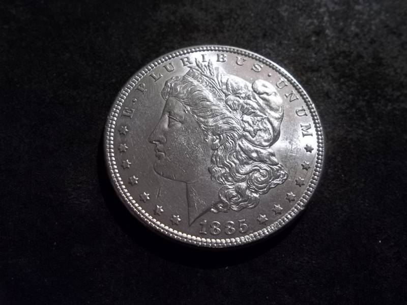 lot 18 image: 1885 Morgan Silver Dollar
