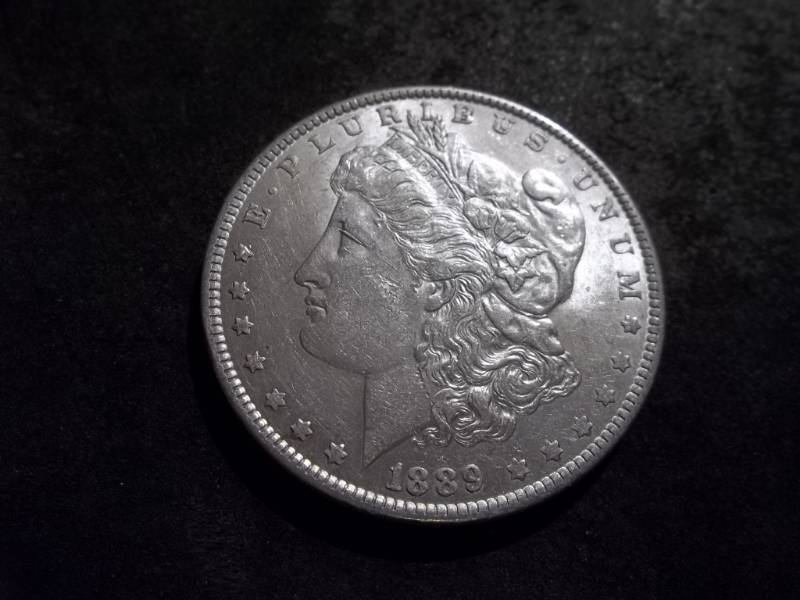 lot 23 image: 1889 Morgan Silver Dollar
