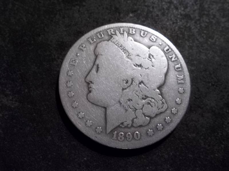 lot 24 image: 1890 O  Morgan Silver Dollar