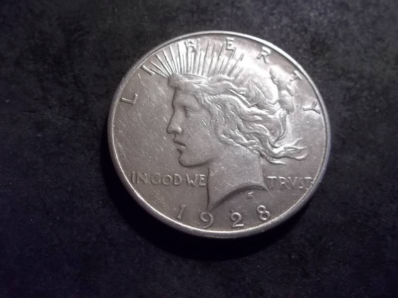 lot 45 image: 1928 S Silver Peace Dollar