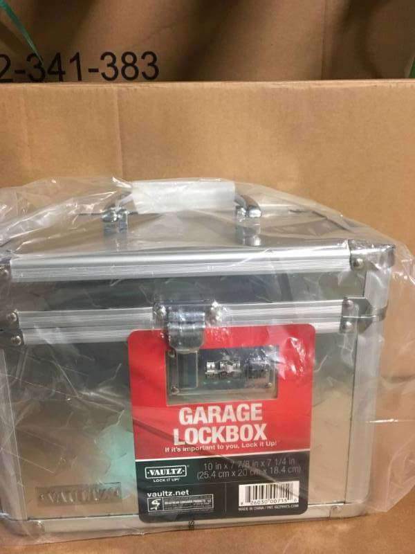 lot 2 image: Vaultz Safe Locking Garage Box open box in like new condition