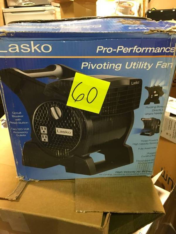 lot 60 image: Lasko Pro Performance Pivoting Blower Fan with Integrated Power Outlets open box in like new condition