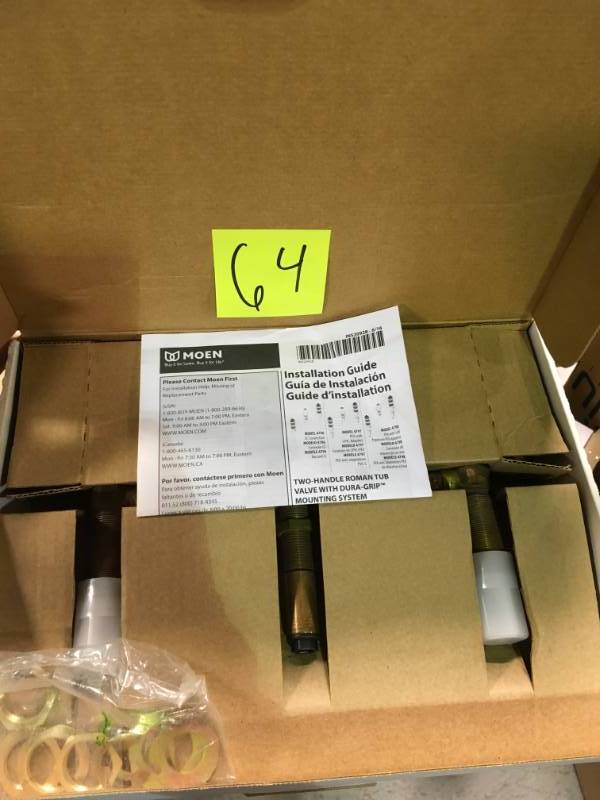 lot 64 image: MOEN 2-Handle 3-Hole Roman Tub 10 in. Center Rough-In Valve - 12 in. CC Connection open box in like new condition
