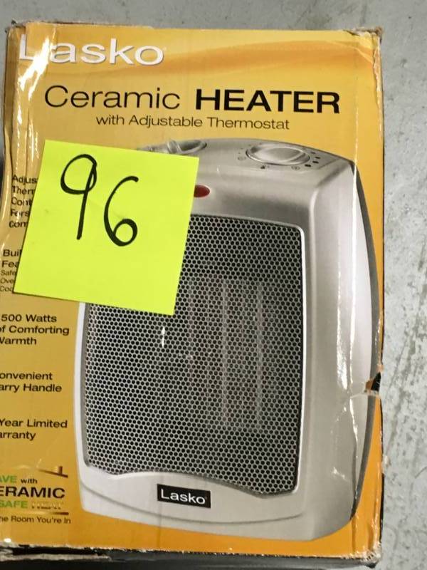 lot 96 image: Lasko 9.2 in. 1500-Watt Electric Portable Ceramic Compact Heater open box in like new condition