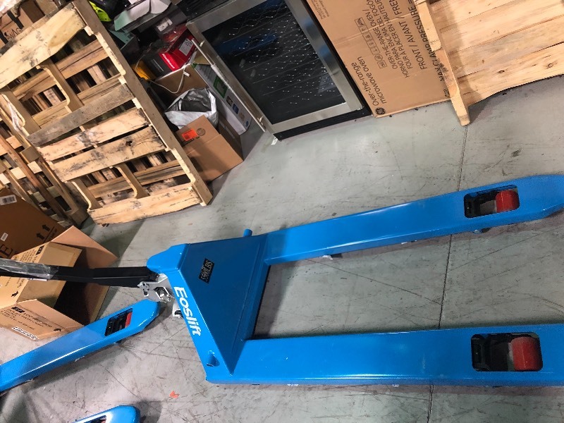 lot 105 image: Eoslift M25 5,500 lbs. 27 in. x 48 in. Manual Pallet Truck German Seal System with Polyurethane Wheels in good conditions