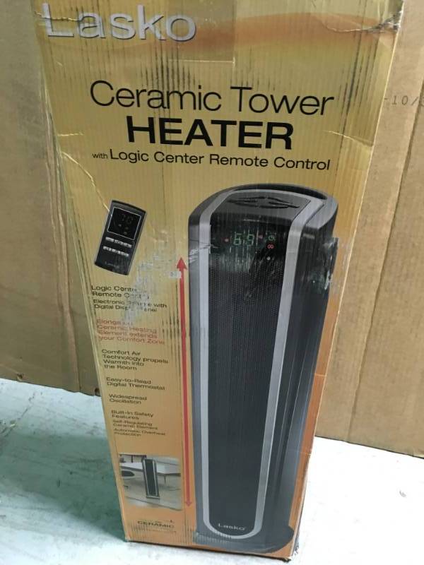 Lasko 1,500 Watt Electric Portable Ceramic Tower Heater open box in like new condition