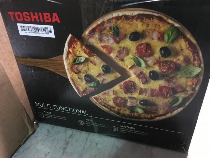 Toshiba 4-Slice Toaster Oven in Stainless Steel open box in like new condition
