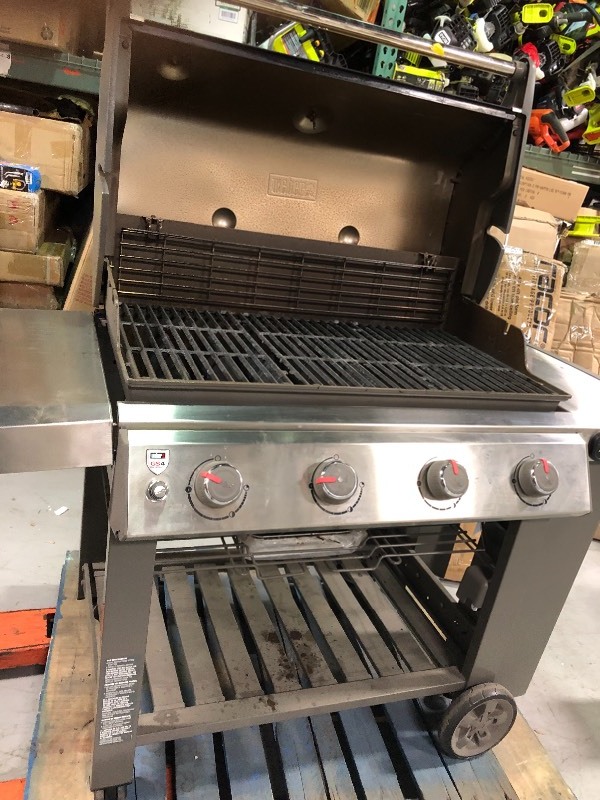 Genesis II E-410 4-Burner Propane Gas Grill in Copper used in good conditions whit small nick on the back