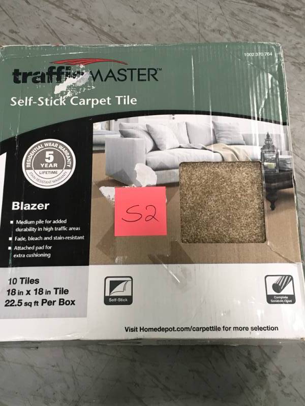 lot 52 image: TrafficMASTER Blazer Candlewood Texture 18 in. x 18 in. Carpet Tile (10 TilesCase) not used