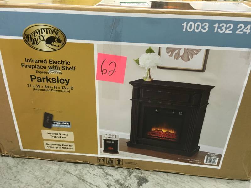 lot 62 image: Hampton Bay Parksley 31 in. Freestanding Compact Infrared Electric Fireplace in Espresso open box in like new condition
