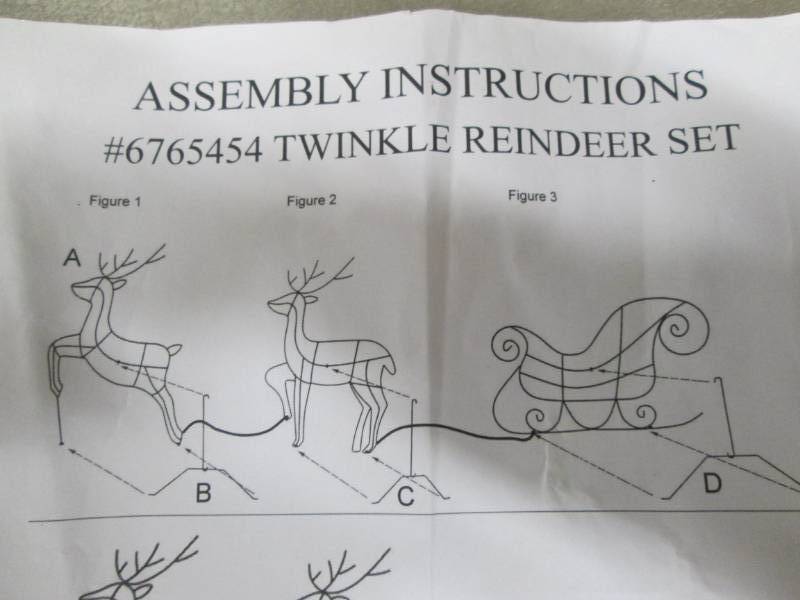 Twinkle Reindeer Set open box, unte...