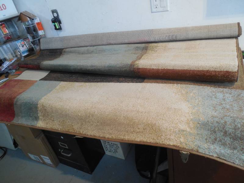 5 X 7 AREA RUG.