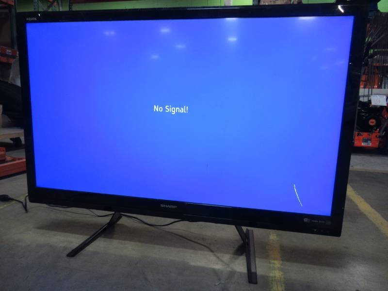 lot 26 image: Sharp 46 Class LED 1080p 120Hz HDTV,(1.7 ultra-slim) LC46LE540U With Remote - LARGE SCRATCH ON BOTTOM RH CORNER.