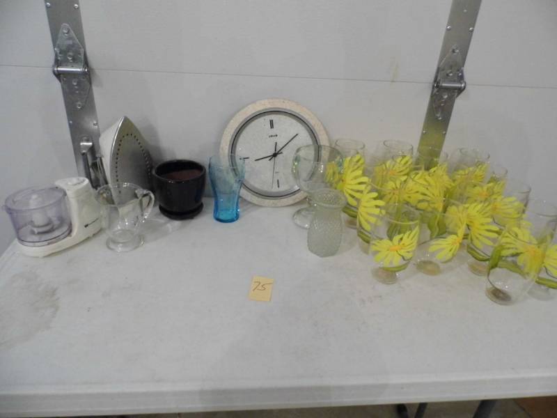 lot 75 image: Plastic Glasses - Iron - Clock
