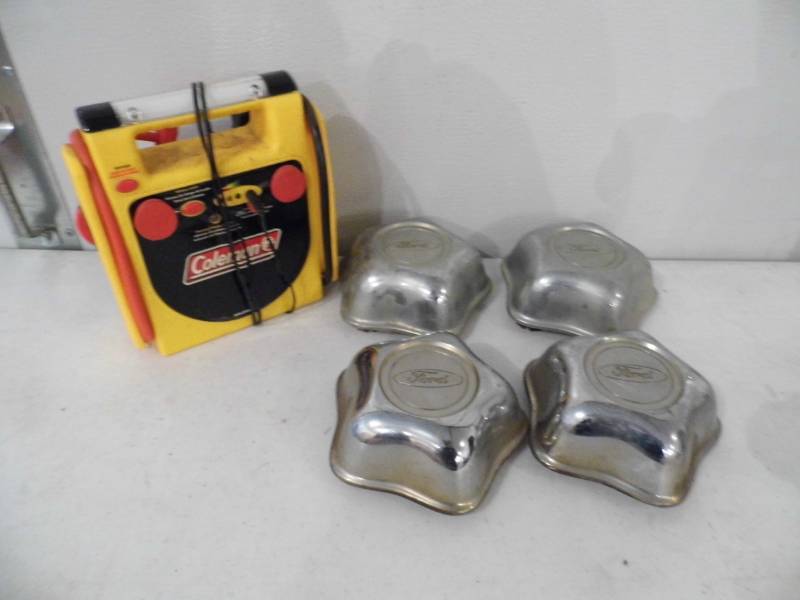 lot 87 image: Lot of 4 Ford Hubcaps - Jump Starter