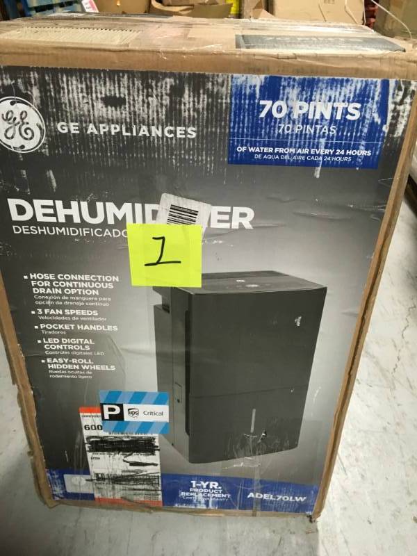 lot 1 image: GE 70 pt. Dehumidifier, ENERGY STAR open box in like new condition