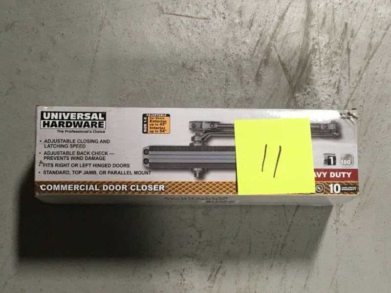 lot 11 image: Universal Hardware Heavy-Duty Bronze Commercial Door Closer
