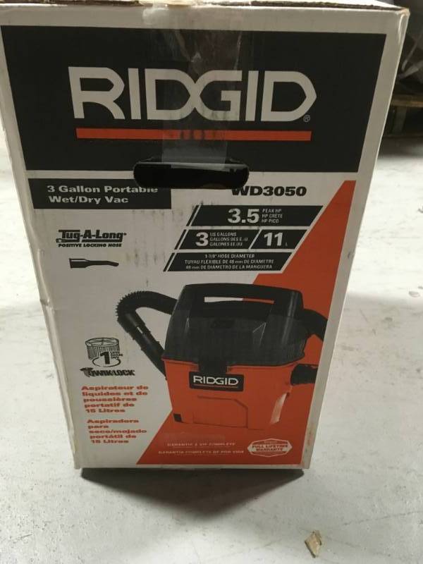 lot 34 image: RIDGID 3 Gal. 3.5-Peak HP Portable Pro WetDry Vacuum  open box in like new condition