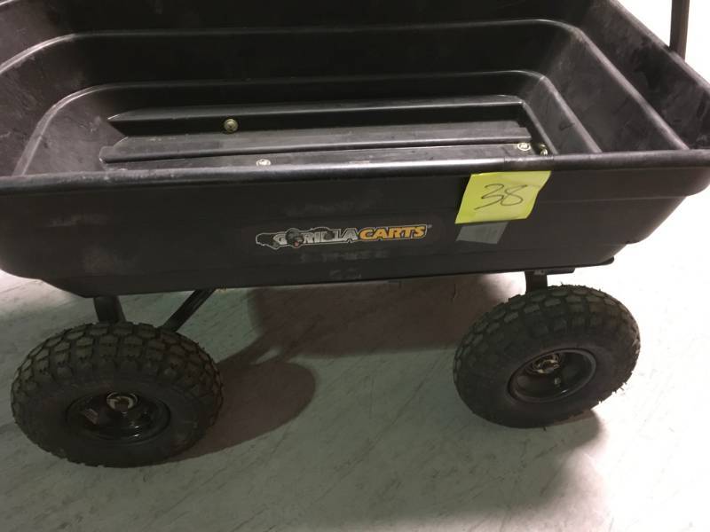 lot 38 image: Gorilla Carts 600 lb. Poly Garden Dump Cart  open box in like new condition