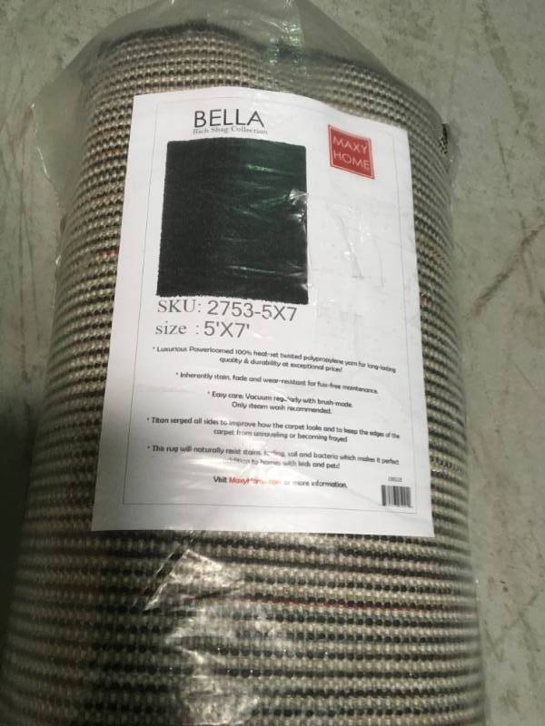 lot 39 image: MAXY HOME BELLA SOLID BLACK 5 FT. X 7 FT. SHAG AREA RUG  open box in like new condition