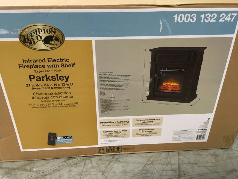 lot 54 image: Hampton Bay Parksley 31 in. Freestanding Compact Infrared Electric Fireplace in Espresso  open box in like new condition