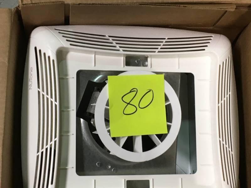 lot 80 image: NuTone 50 CFM Ceiling Bathroom Exhaust Fan with Light  open box in like new condition
