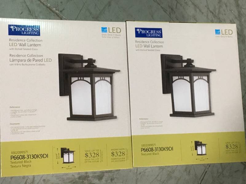 lot 85 image: Progress Lighting Residence Collection 1-Light Outdoor 6 Inch Textured Black LED Wall Lantern LOT OF 2 not used