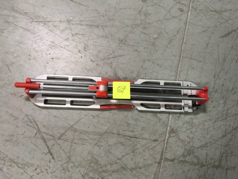 lot 87 image: Rubi 24 in. Star Tile Cutter USED MISSING PIN